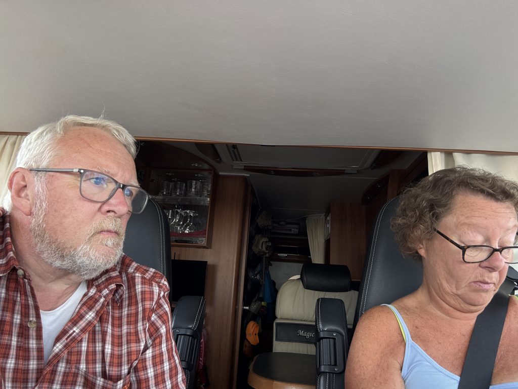 Vincent driving the motorhome, Pip passenger