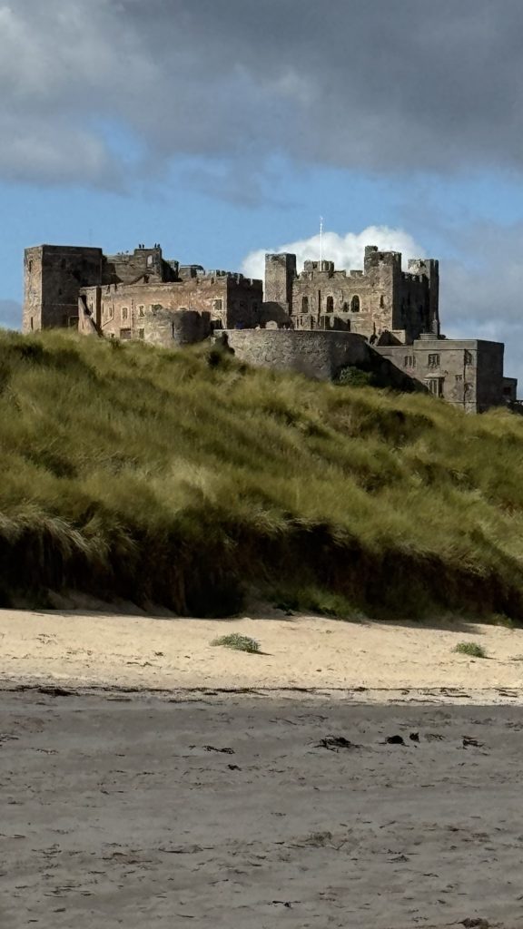 Rear view of Bamburgh Castle from the beach