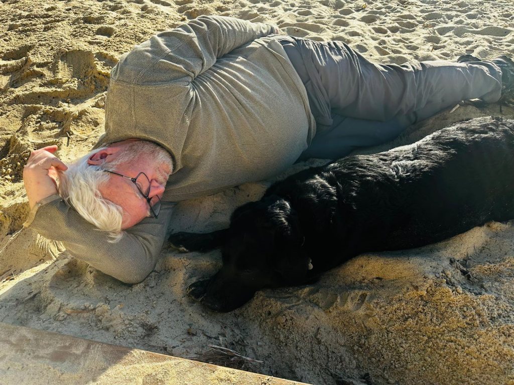 Vincent and Scylla sleeping on the beach